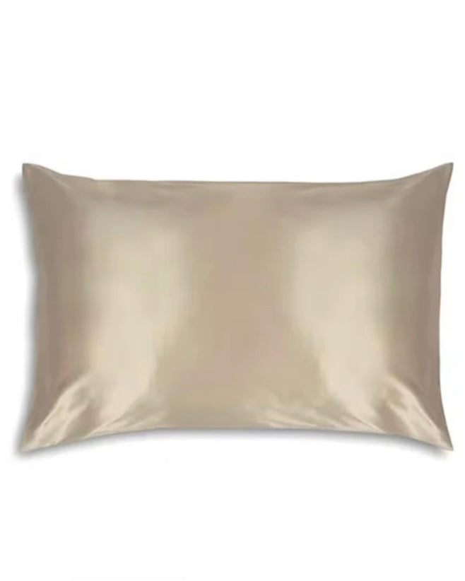 Beige satin pillowcase on a white background